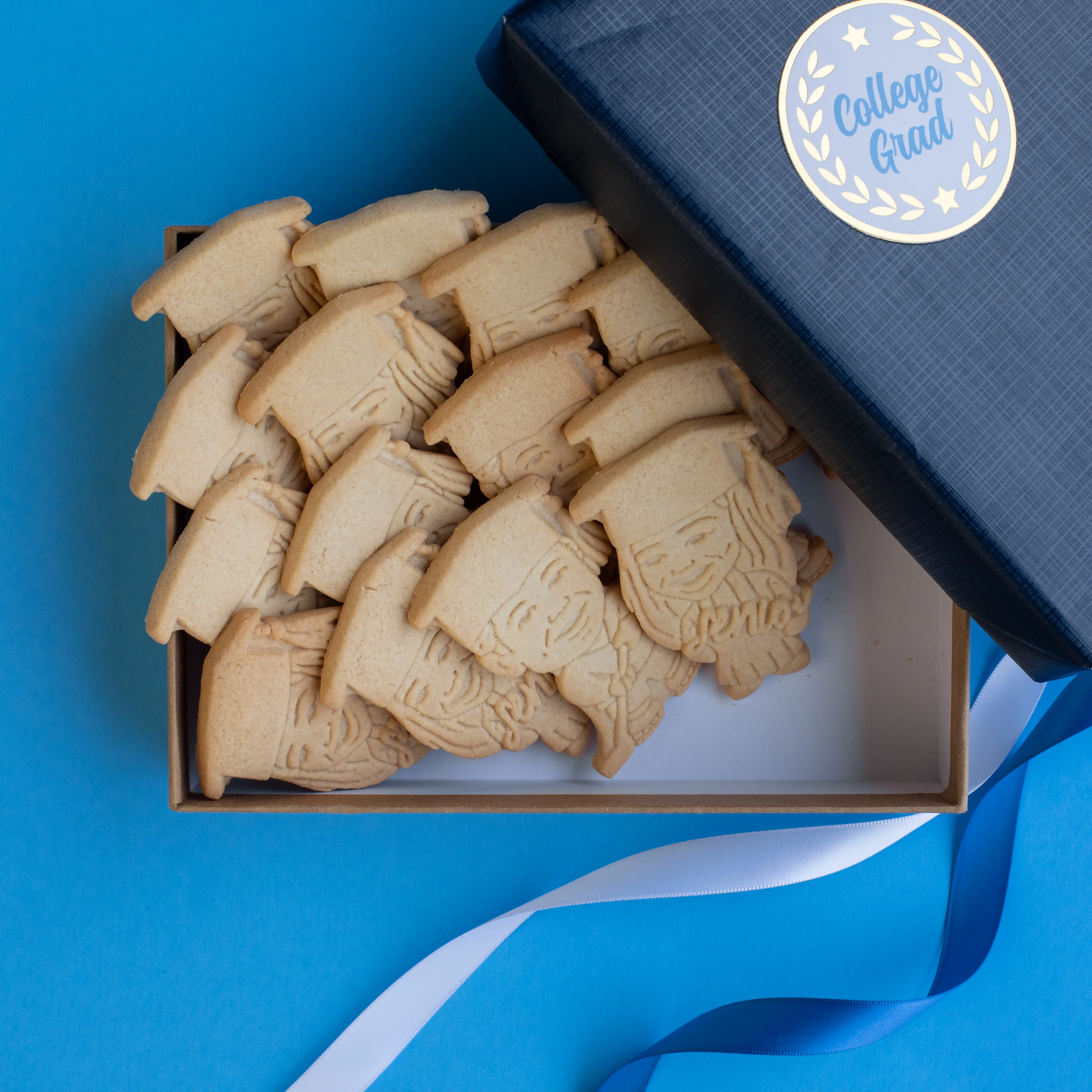 Premium graduation cookie gift box with College Grad sticker and diploma decorations