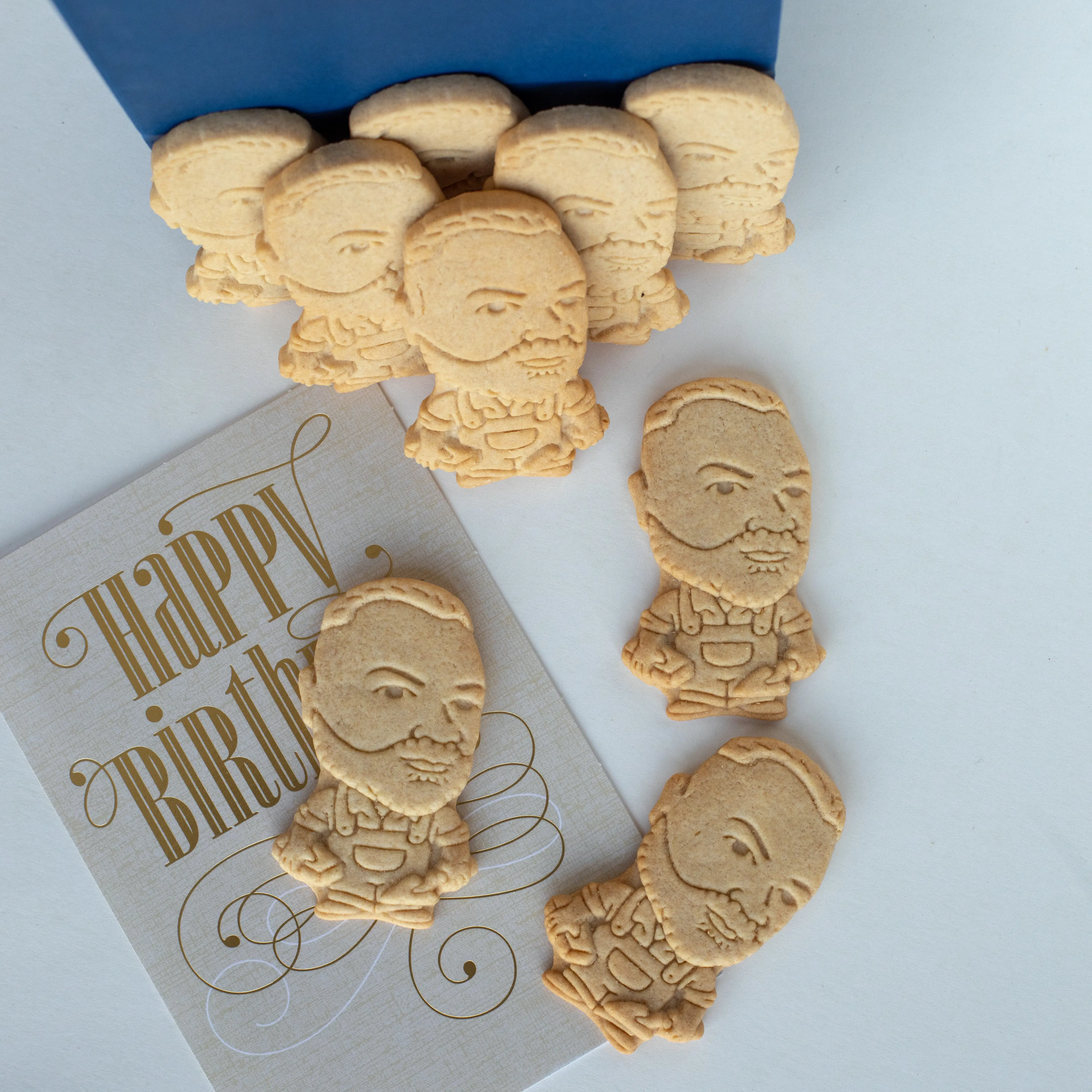 Custom face cookies for a milestone birthday party celebration